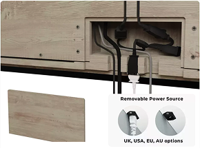 The cable compartment at the back of the desk, with the removable power cable.