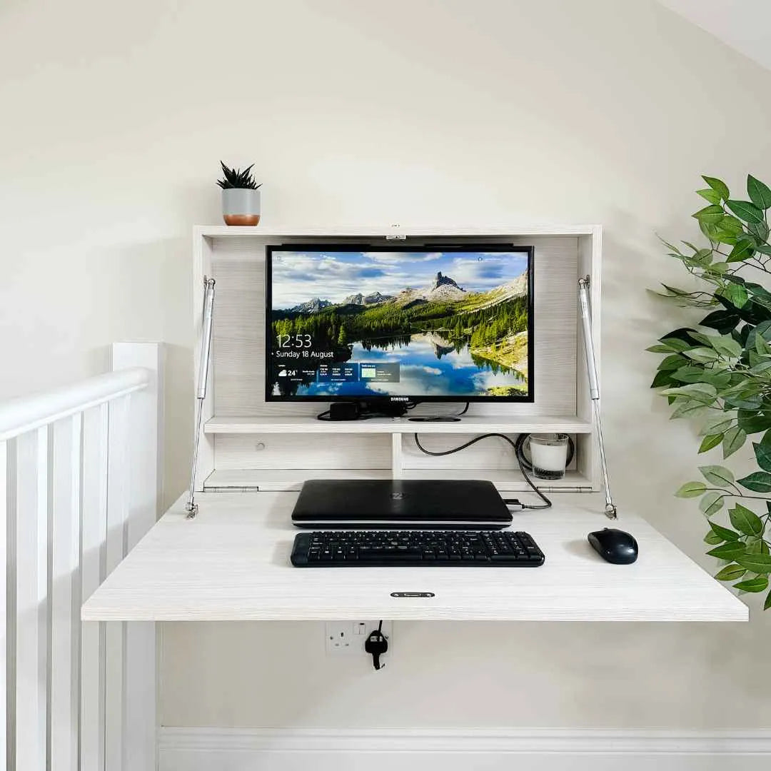 Open DropTop Light on a white wall with a monitor, keyboard and mouse on the desktop.