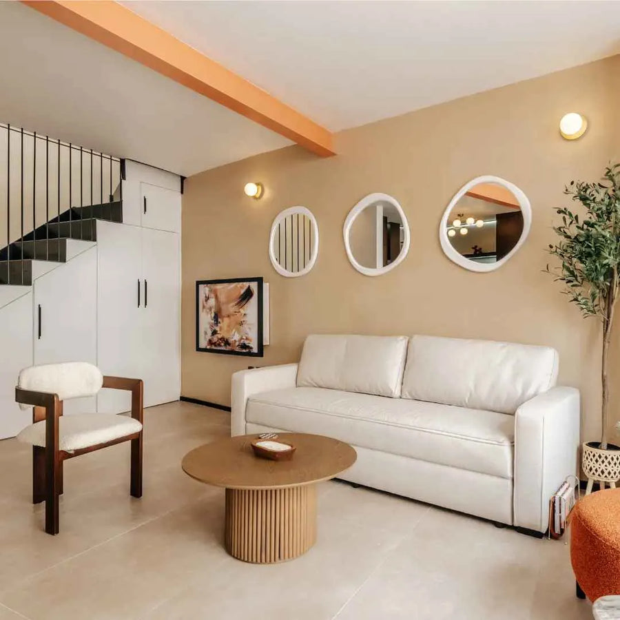 Closed DropTop desk hanging as framed artwork in a bright living room.