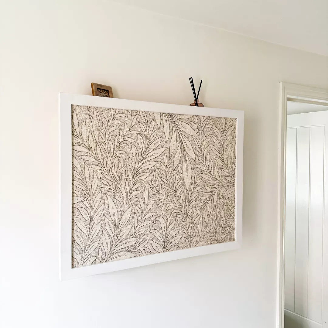 Closed white DropTop Single 29 fronted with a botanical print in a hallway.